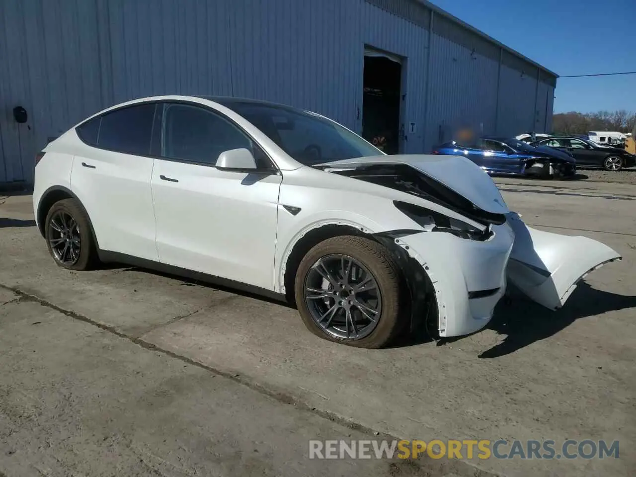 4 Photograph of a damaged car 7SAYGDED1RF187025 TESLA MODEL Y 2024