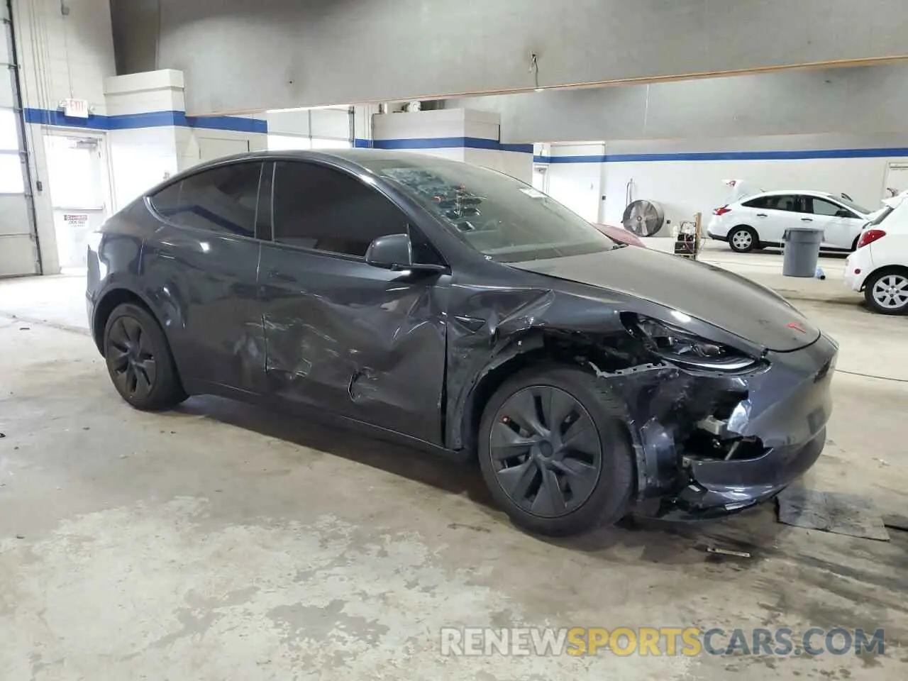 4 Photograph of a damaged car 7SAYGDED1RF207273 TESLA MODEL Y 2024