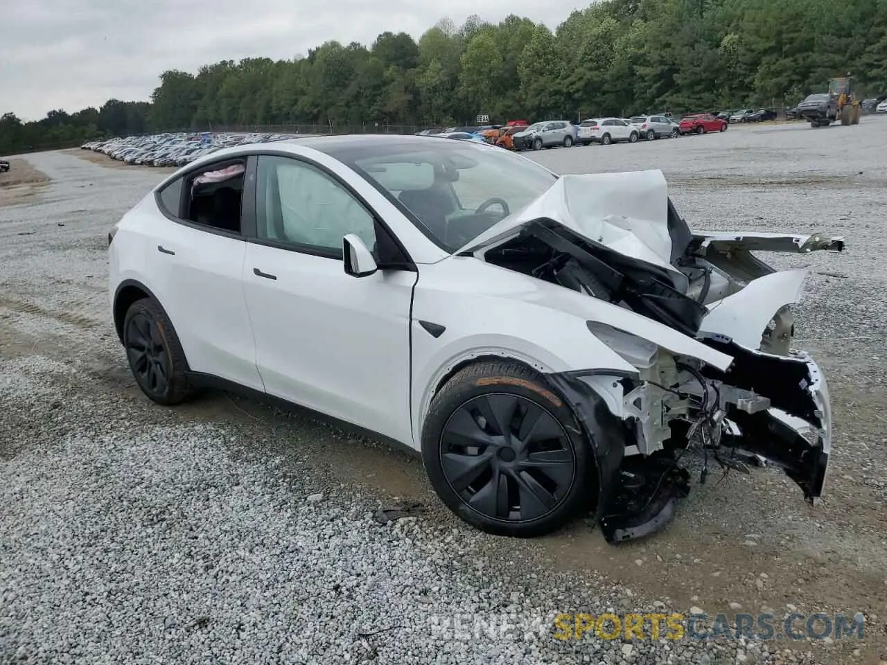 4 Photograph of a damaged car 7SAYGDED2RA301448 TESLA MODEL Y 2024