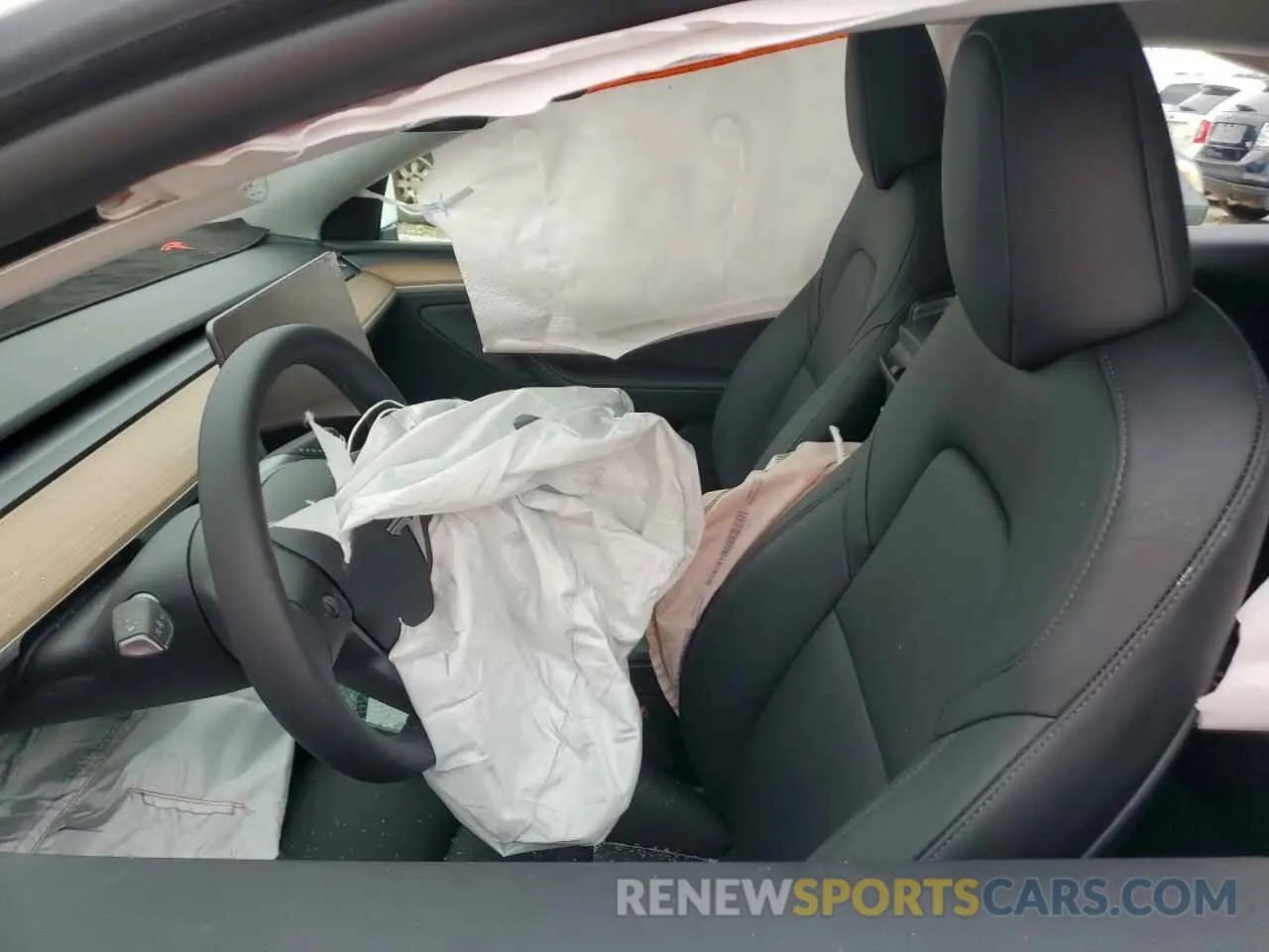 7 Photograph of a damaged car 7SAYGDED2RA301448 TESLA MODEL Y 2024