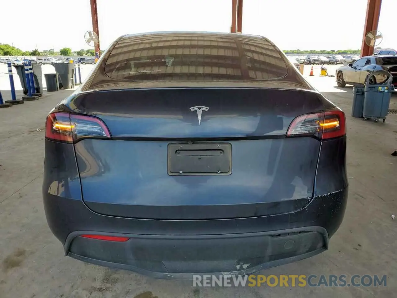 6 Photograph of a damaged car 7SAYGDED2RA304558 TESLA MODEL Y 2024