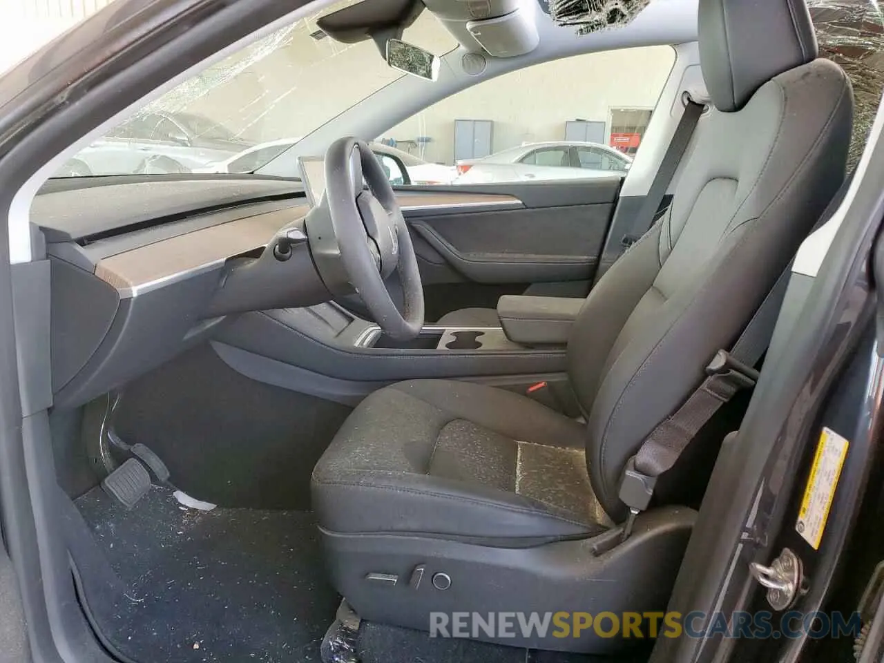 7 Photograph of a damaged car 7SAYGDED2RA304558 TESLA MODEL Y 2024
