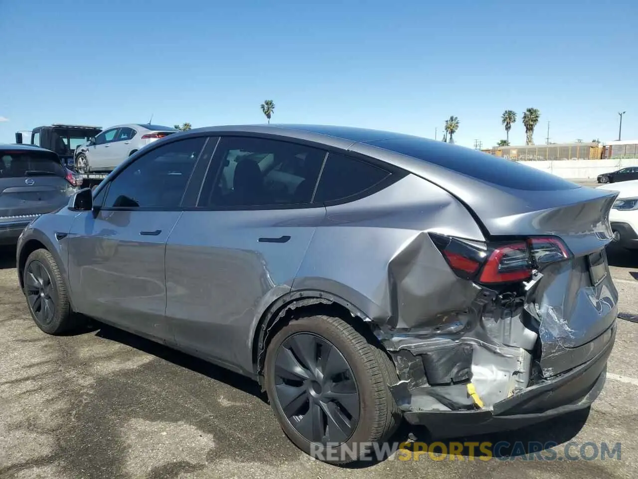 2 Photograph of a damaged car 7SAYGDED2RA314104 TESLA MODEL Y 2024