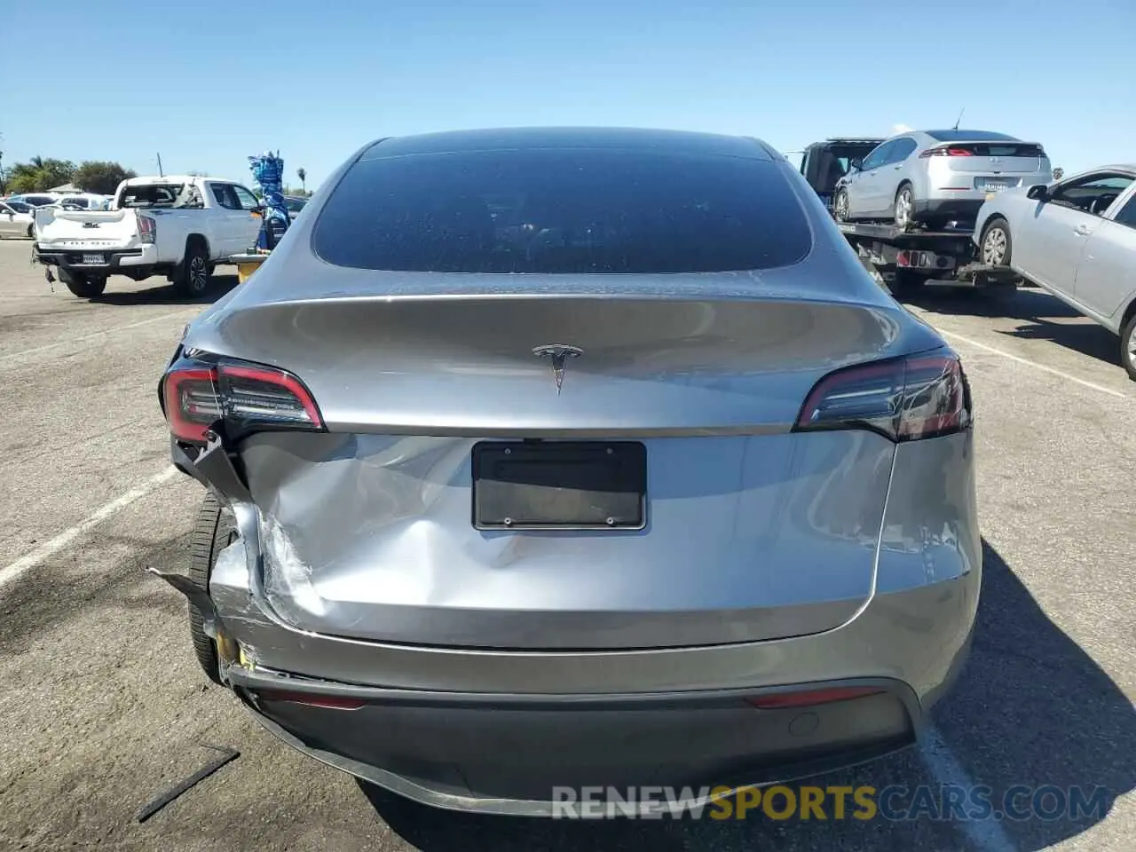 6 Photograph of a damaged car 7SAYGDED2RA314104 TESLA MODEL Y 2024