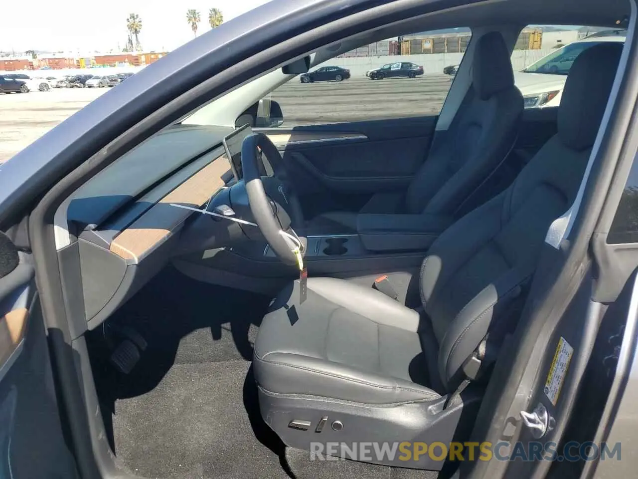7 Photograph of a damaged car 7SAYGDED2RA314104 TESLA MODEL Y 2024