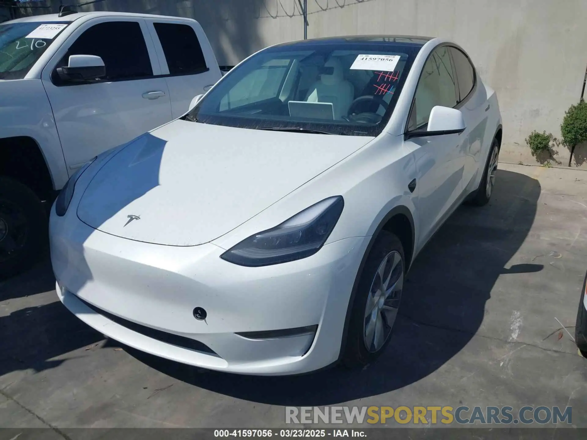 2 Photograph of a damaged car 7SAYGDED2RF017448 TESLA MODEL Y 2024