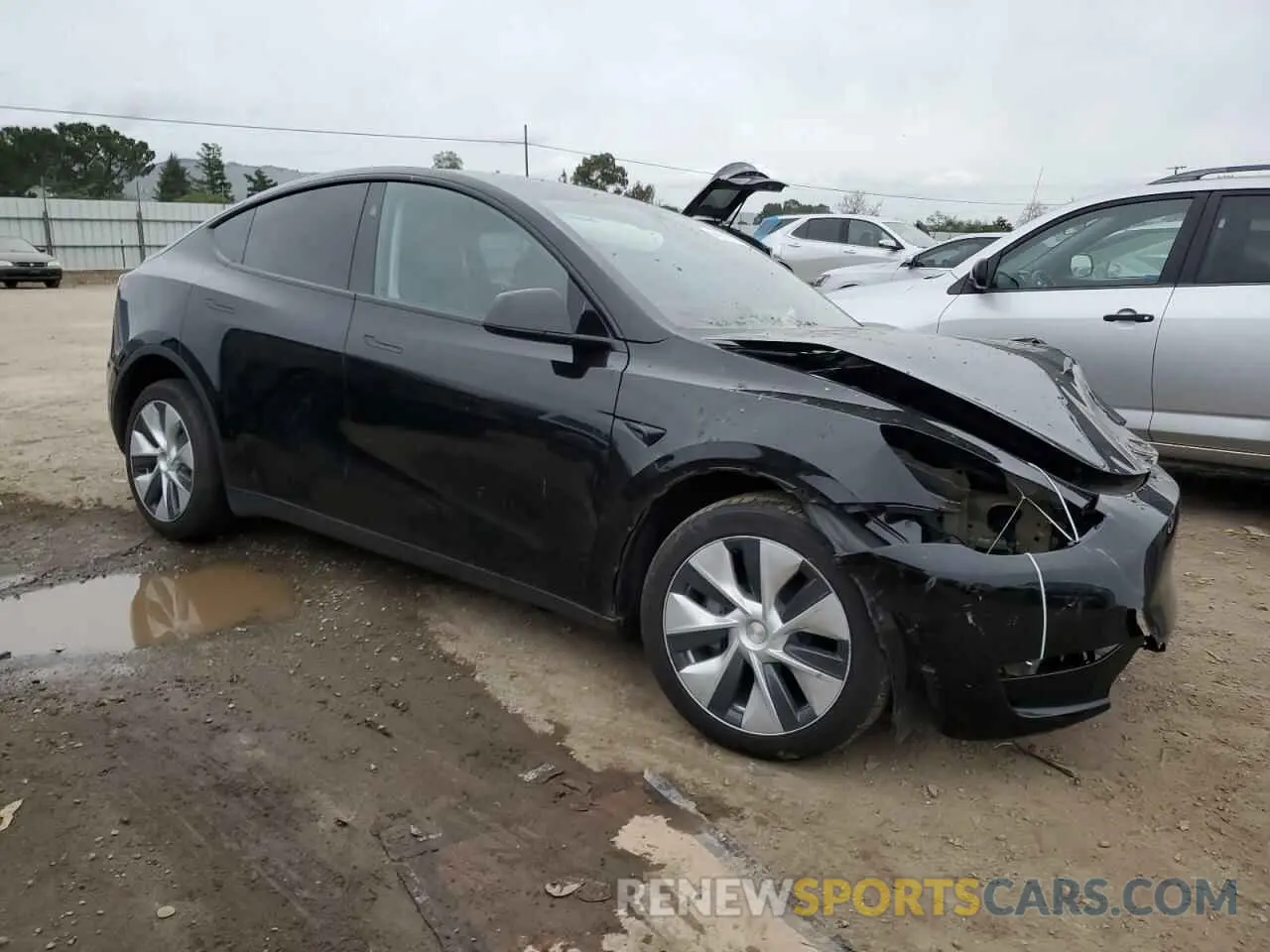 4 Photograph of a damaged car 7SAYGDED2RF028899 TESLA MODEL Y 2024