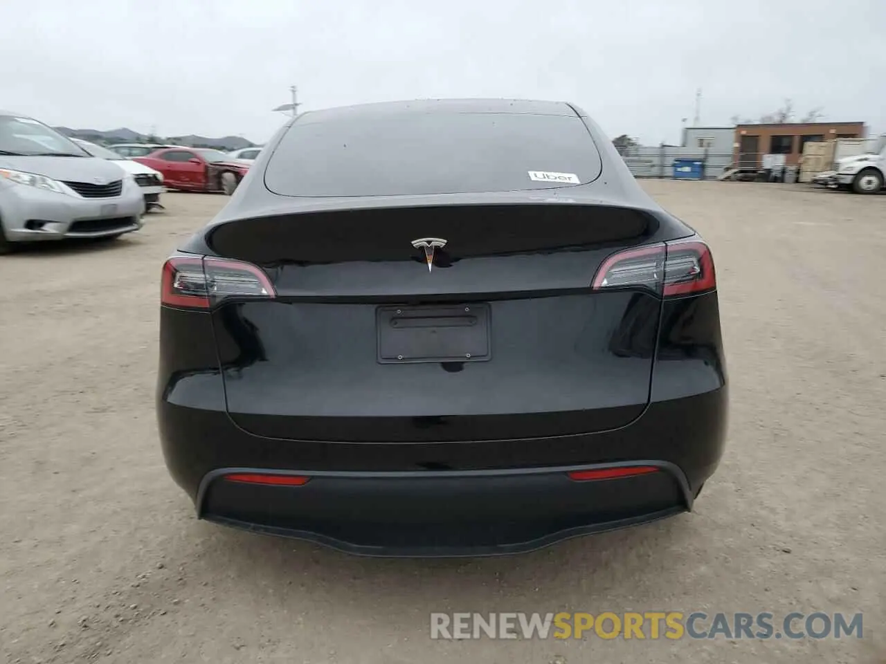 6 Photograph of a damaged car 7SAYGDED2RF028899 TESLA MODEL Y 2024