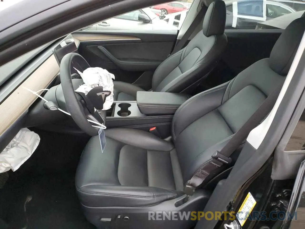 7 Photograph of a damaged car 7SAYGDED2RF028899 TESLA MODEL Y 2024