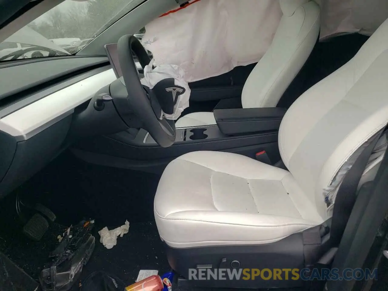 7 Photograph of a damaged car 7SAYGDED2RF037005 TESLA MODEL Y 2024