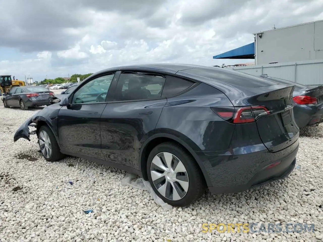 2 Photograph of a damaged car 7SAYGDED2RF040079 TESLA MODEL Y 2024