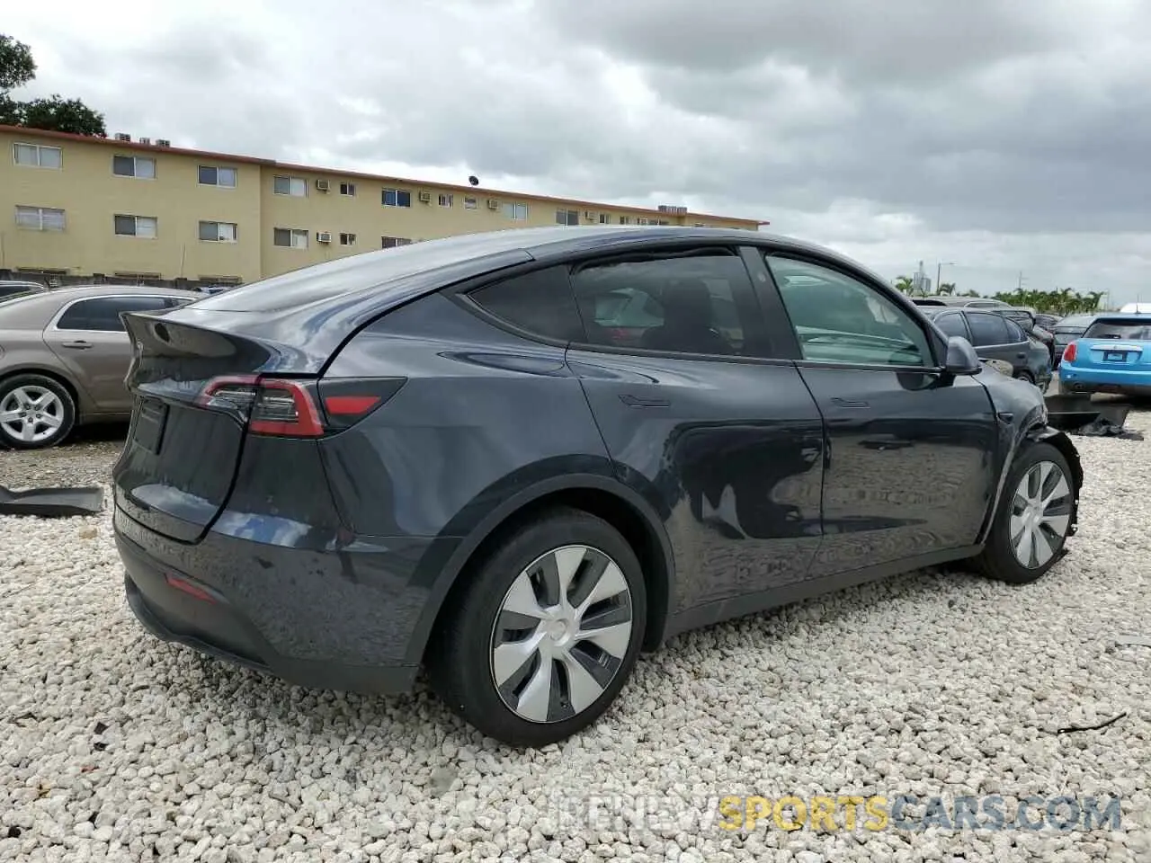 3 Photograph of a damaged car 7SAYGDED2RF040079 TESLA MODEL Y 2024
