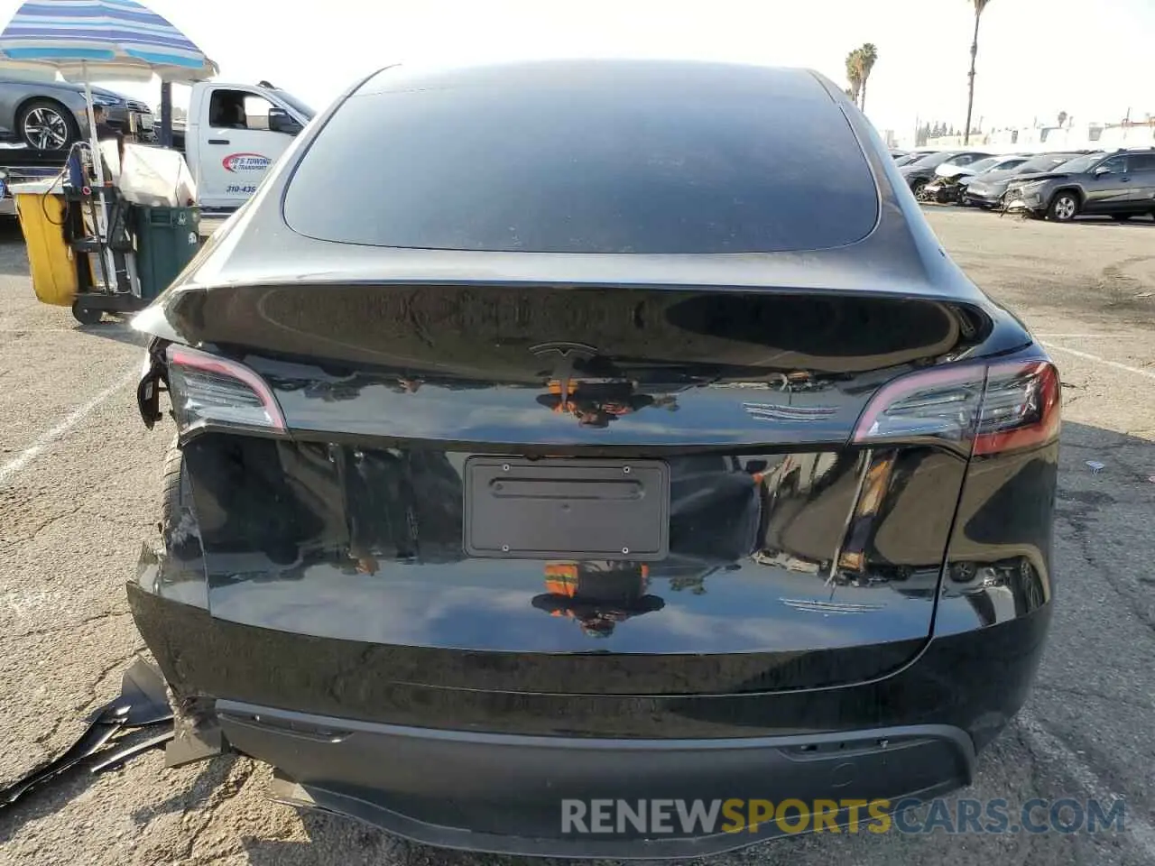 6 Photograph of a damaged car 7SAYGDED2RF045993 TESLA MODEL Y 2024