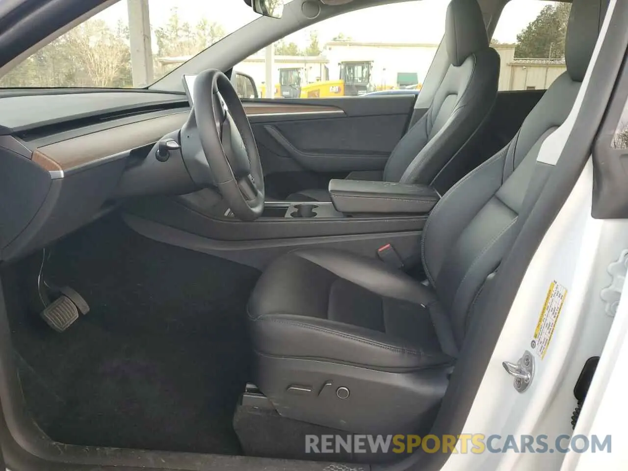 7 Photograph of a damaged car 7SAYGDED2RF097382 TESLA MODEL Y 2024