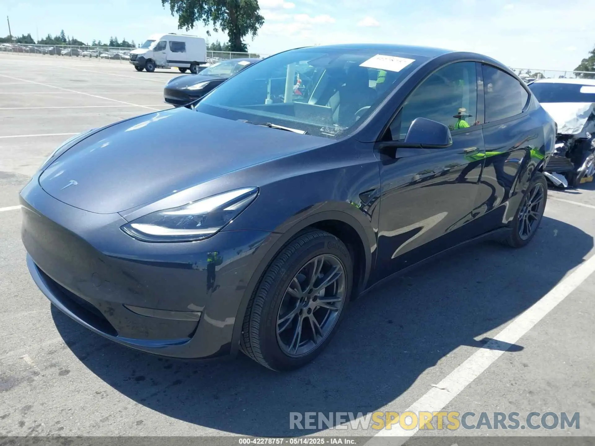 2 Photograph of a damaged car 7SAYGDED2RF102144 TESLA MODEL Y 2024