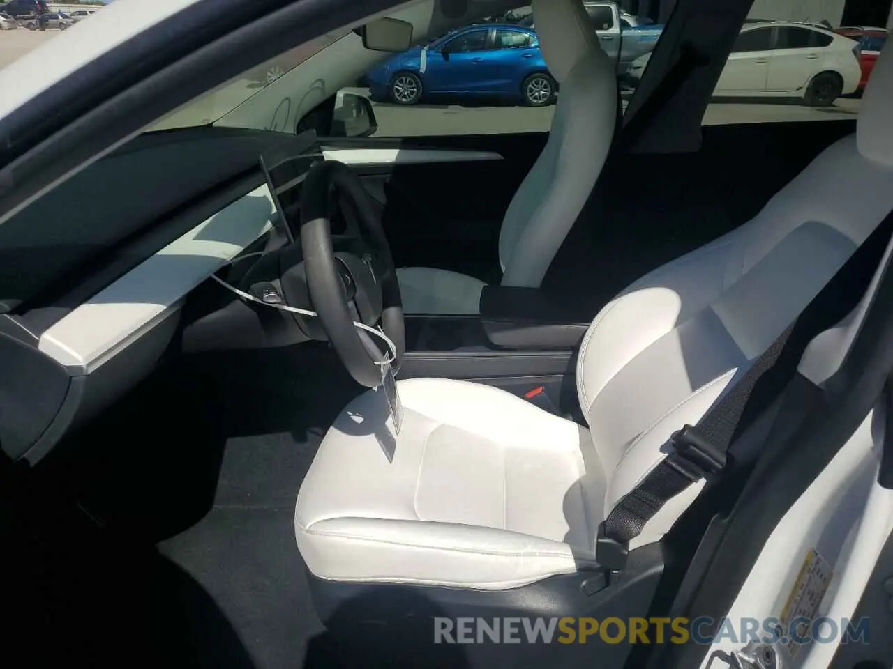 7 Photograph of a damaged car 7SAYGDED2RF164790 TESLA MODEL Y 2024