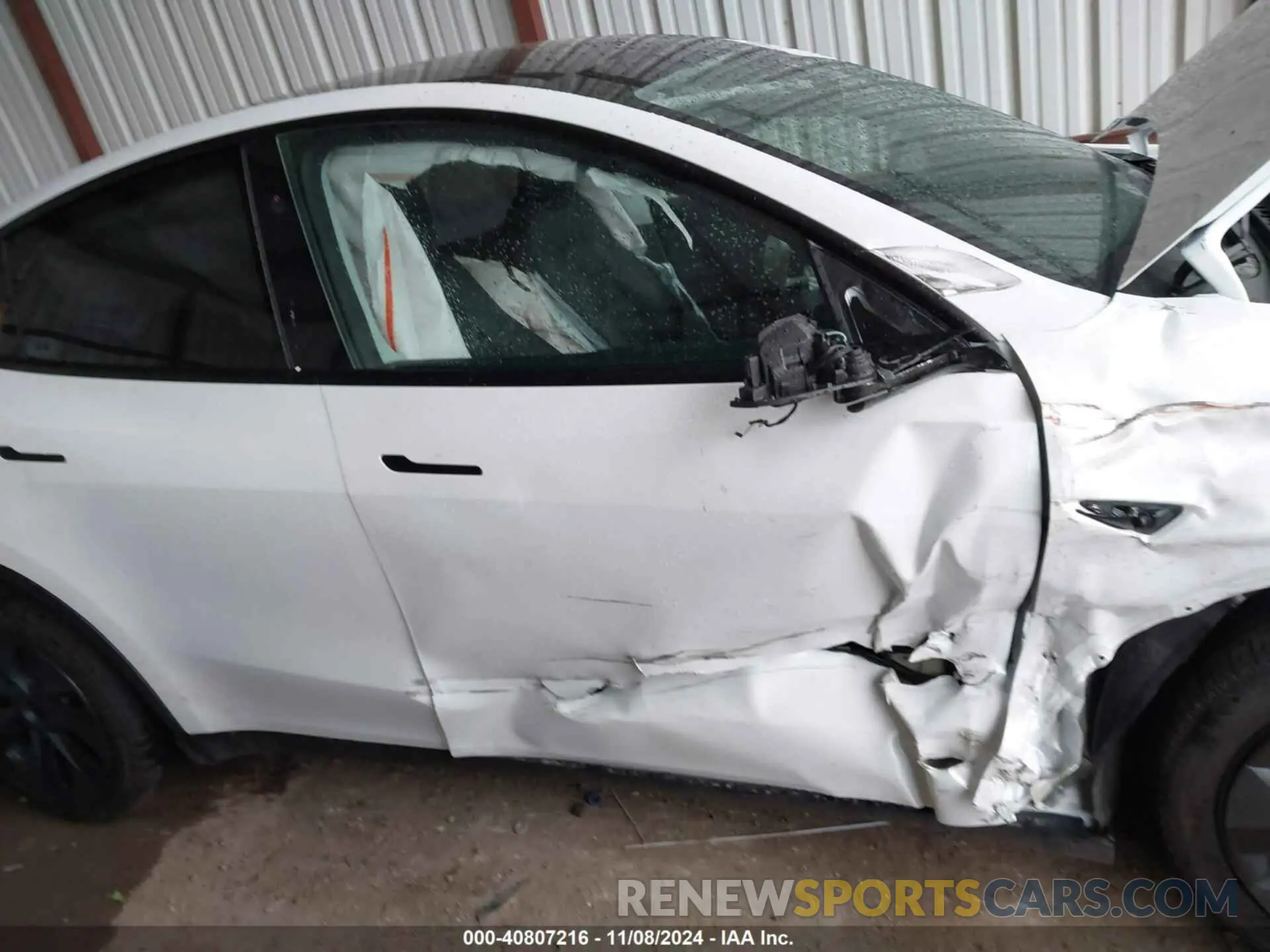12 Photograph of a damaged car 7SAYGDED3RA295031 TESLA MODEL Y 2024