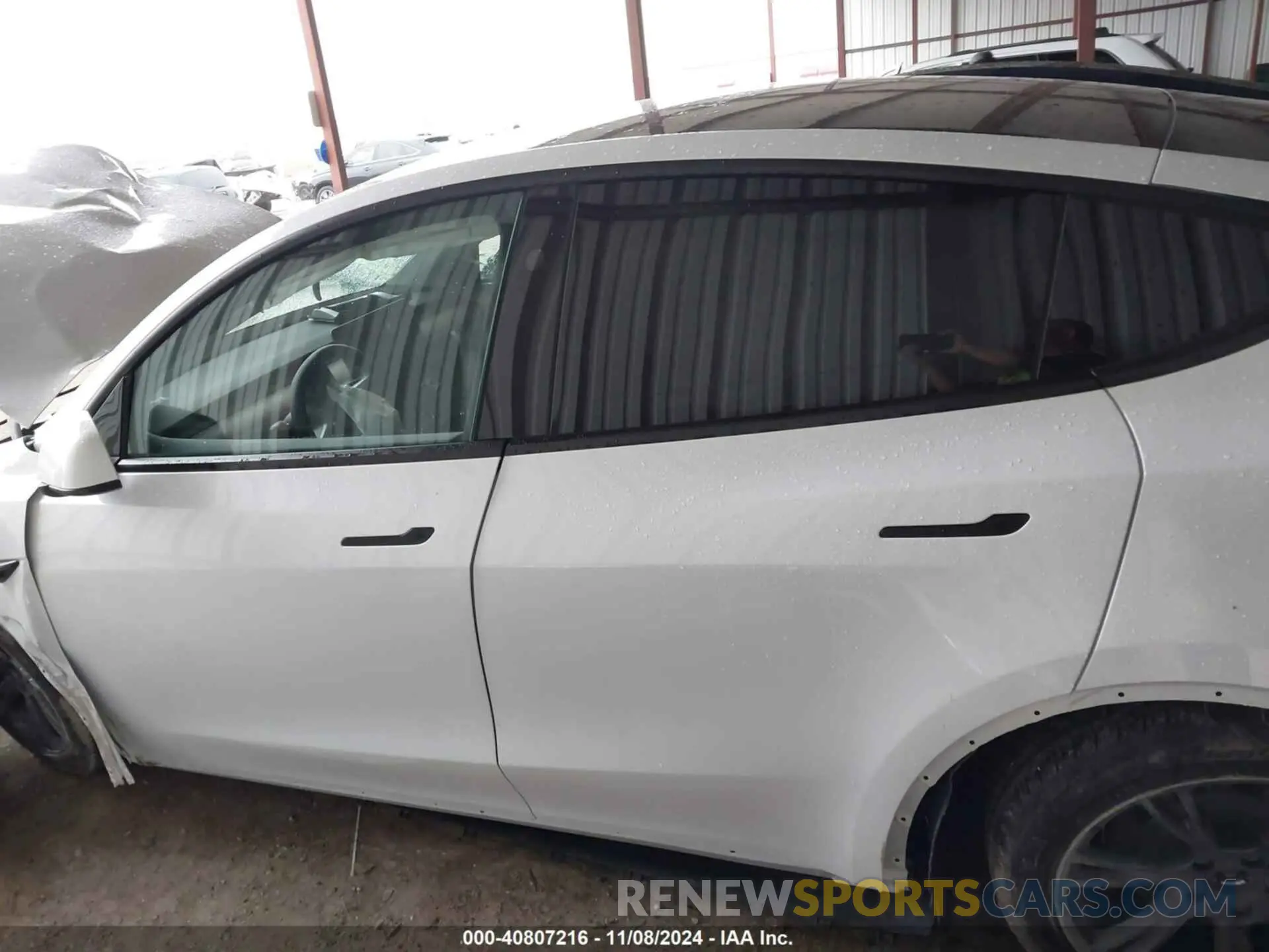 13 Photograph of a damaged car 7SAYGDED3RA295031 TESLA MODEL Y 2024