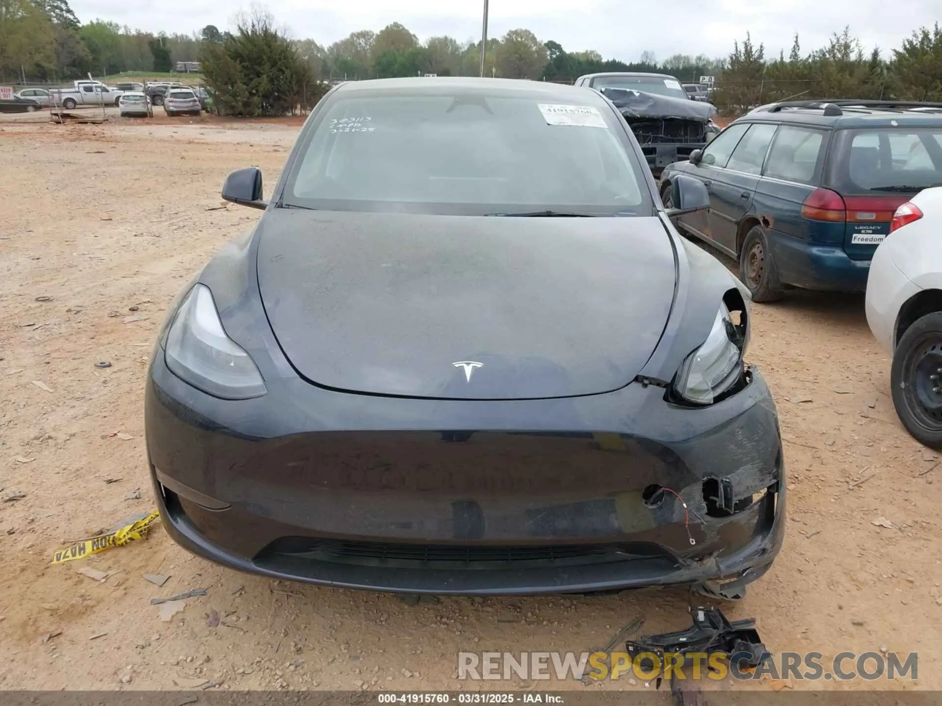11 Photograph of a damaged car 7SAYGDED3RA303113 TESLA MODEL Y 2024