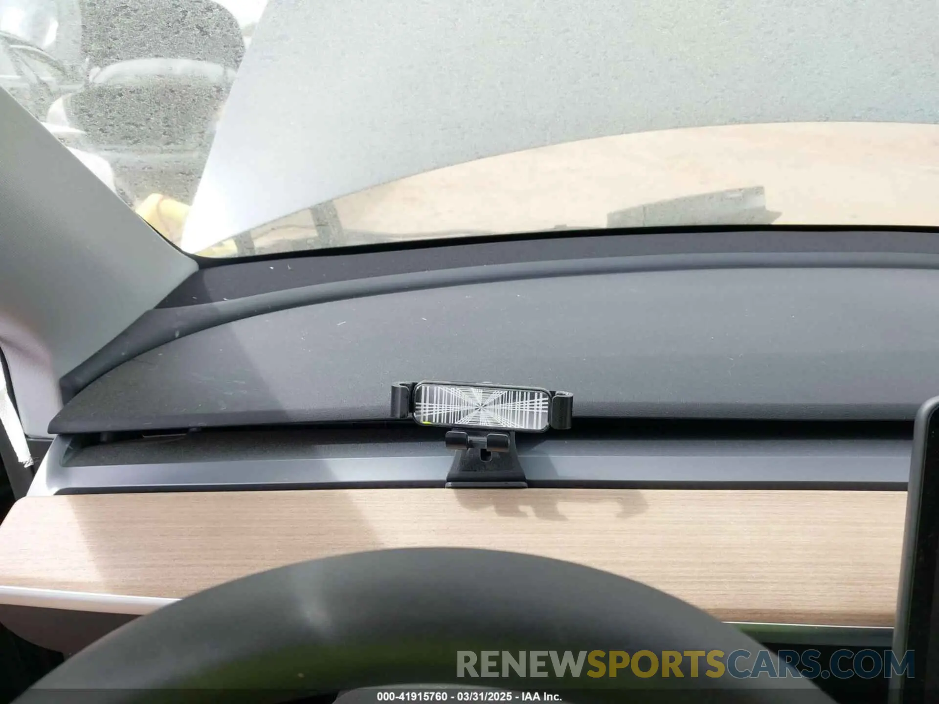 7 Photograph of a damaged car 7SAYGDED3RA303113 TESLA MODEL Y 2024