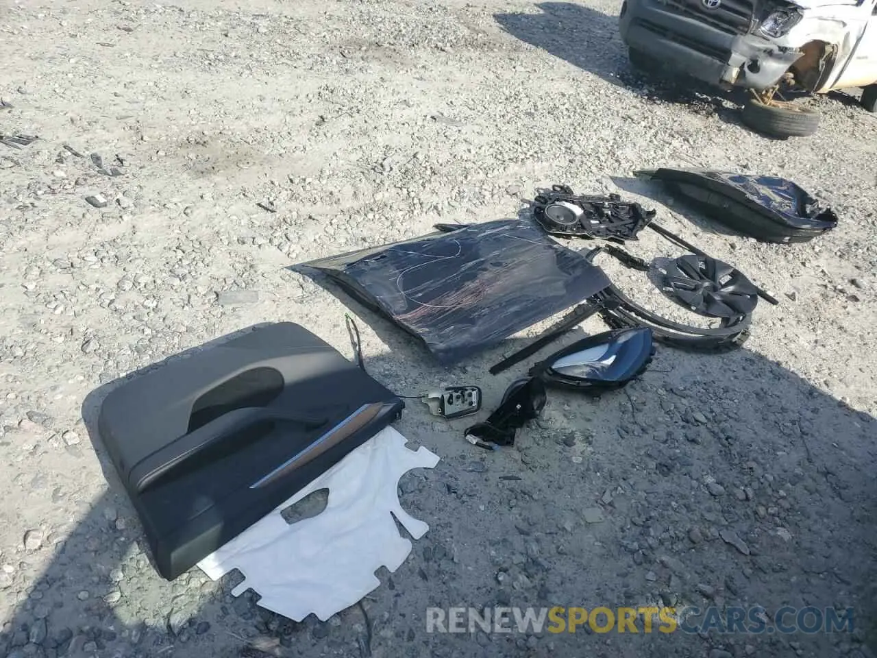 13 Photograph of a damaged car 7SAYGDED3RA330876 TESLA MODEL Y 2024