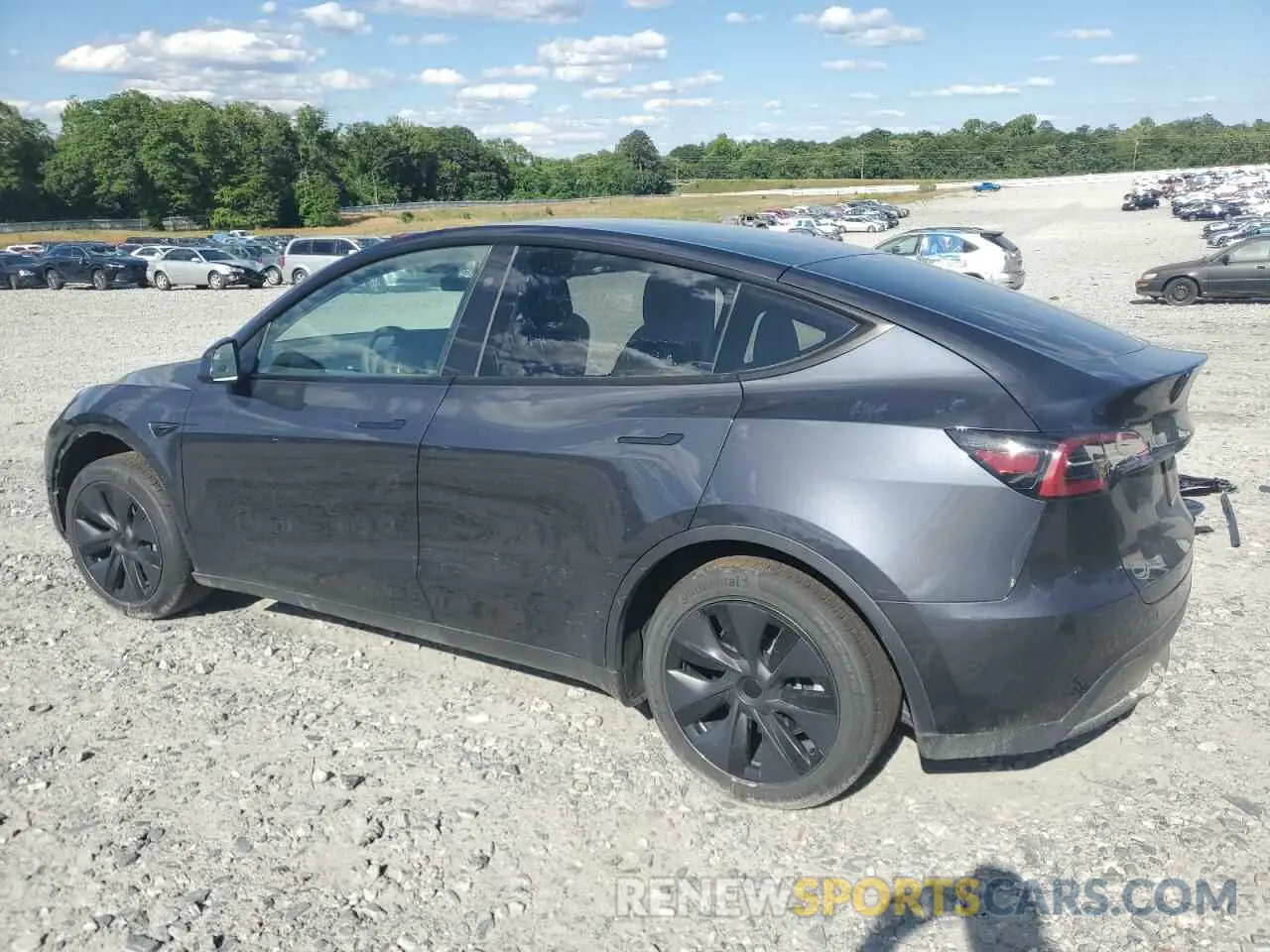 2 Photograph of a damaged car 7SAYGDED3RA330876 TESLA MODEL Y 2024