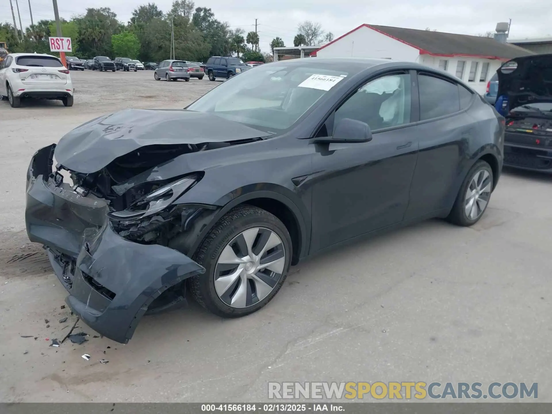 2 Photograph of a damaged car 7SAYGDED3RF002246 TESLA MODEL Y 2024