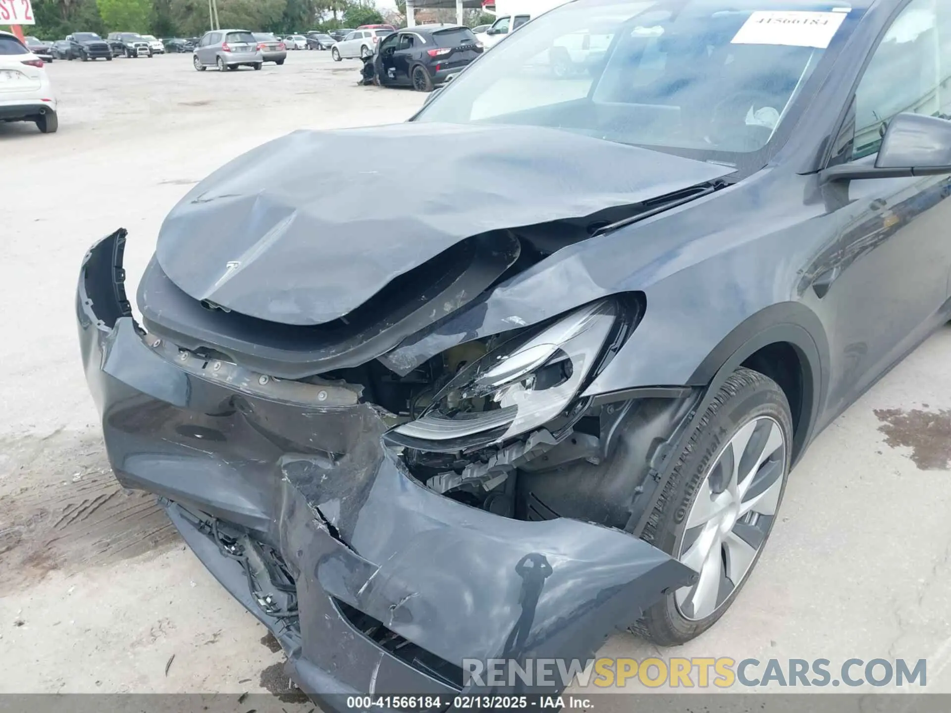 6 Photograph of a damaged car 7SAYGDED3RF002246 TESLA MODEL Y 2024