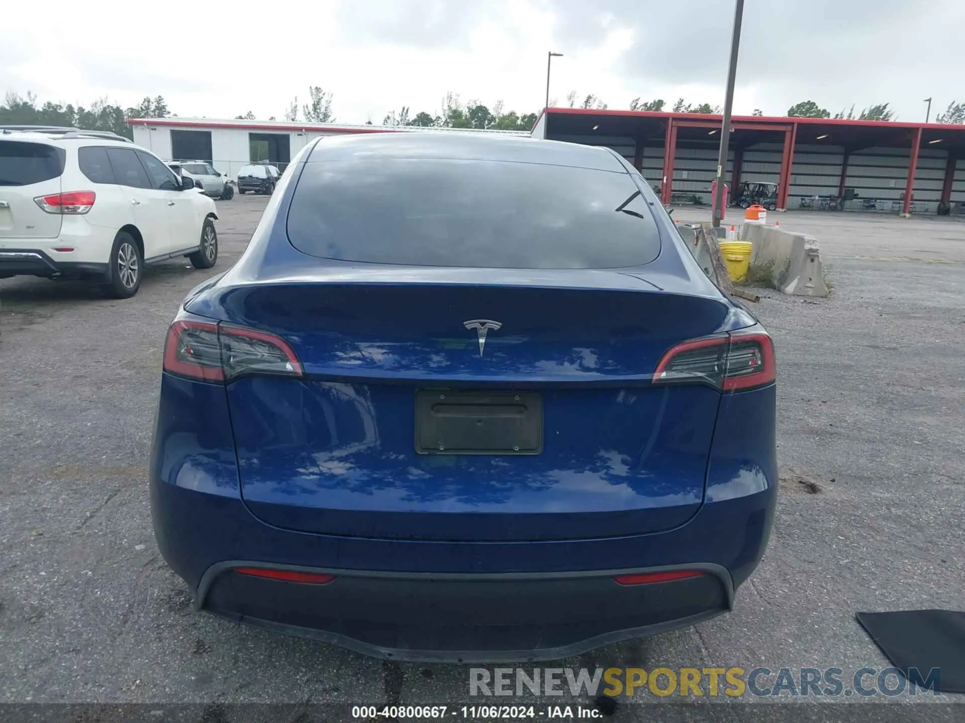 16 Photograph of a damaged car 7SAYGDED3RF032671 TESLA MODEL Y 2024