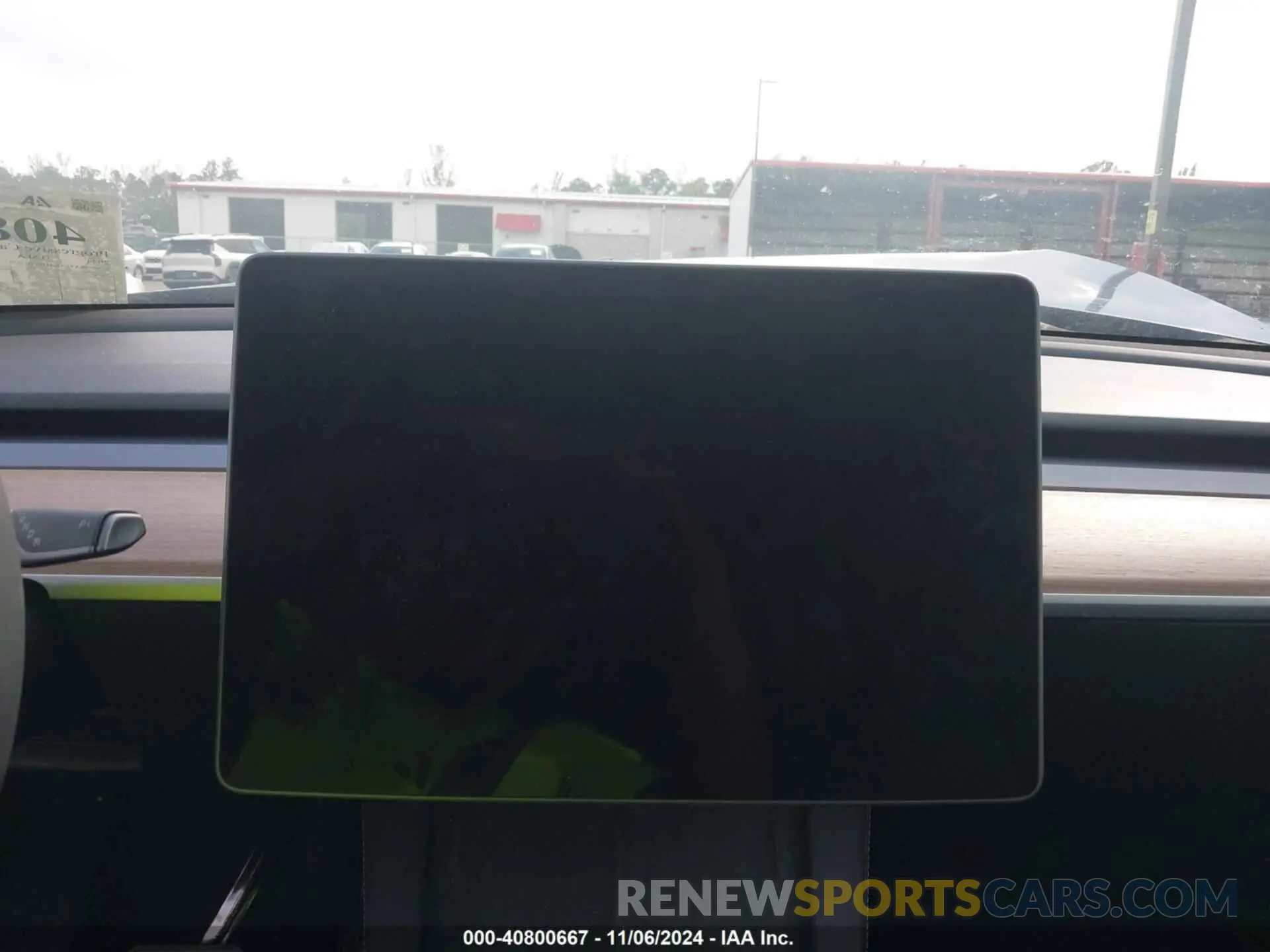 7 Photograph of a damaged car 7SAYGDED3RF032671 TESLA MODEL Y 2024