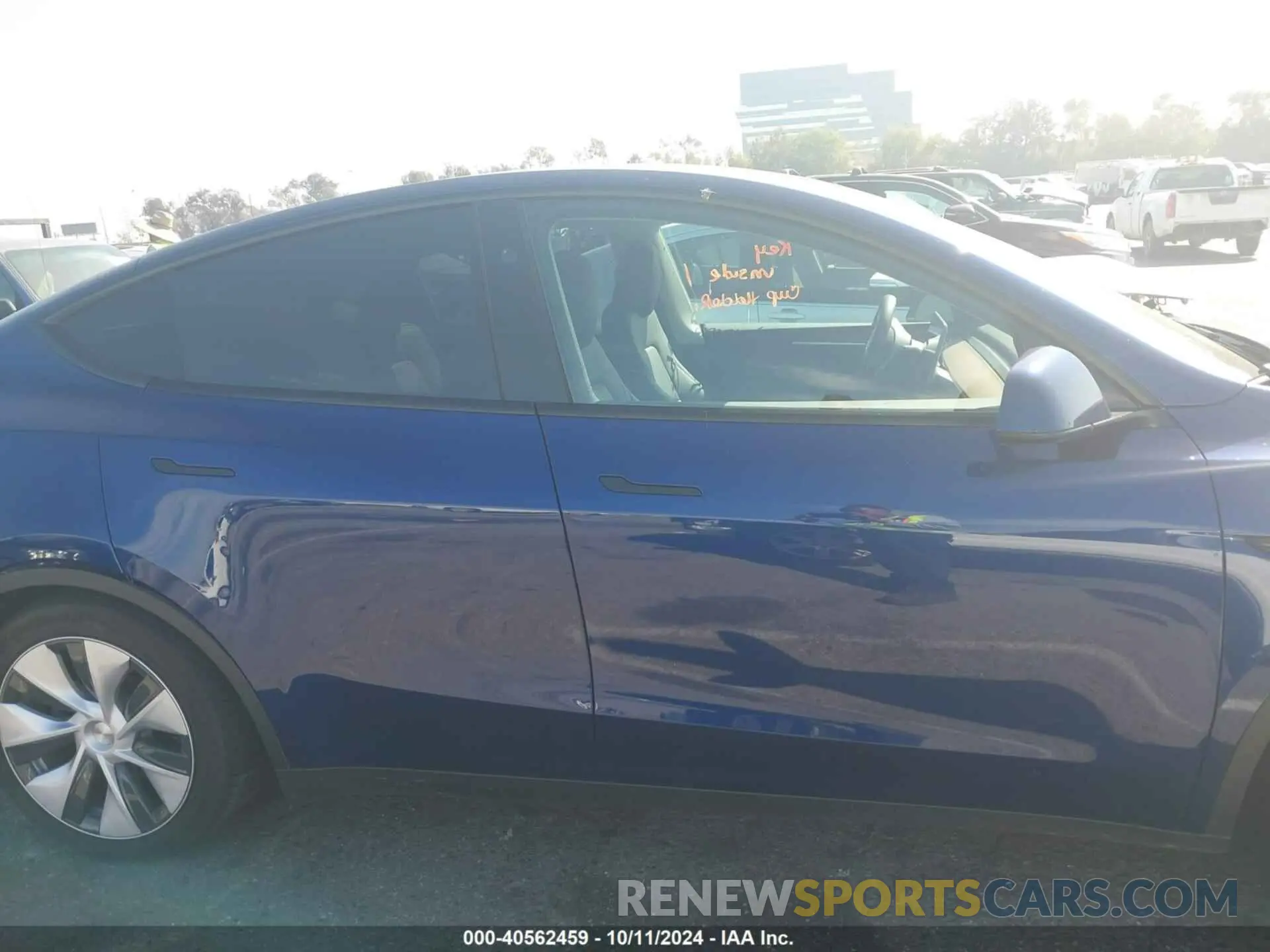 13 Photograph of a damaged car 7SAYGDED3RF047803 TESLA MODEL Y 2024