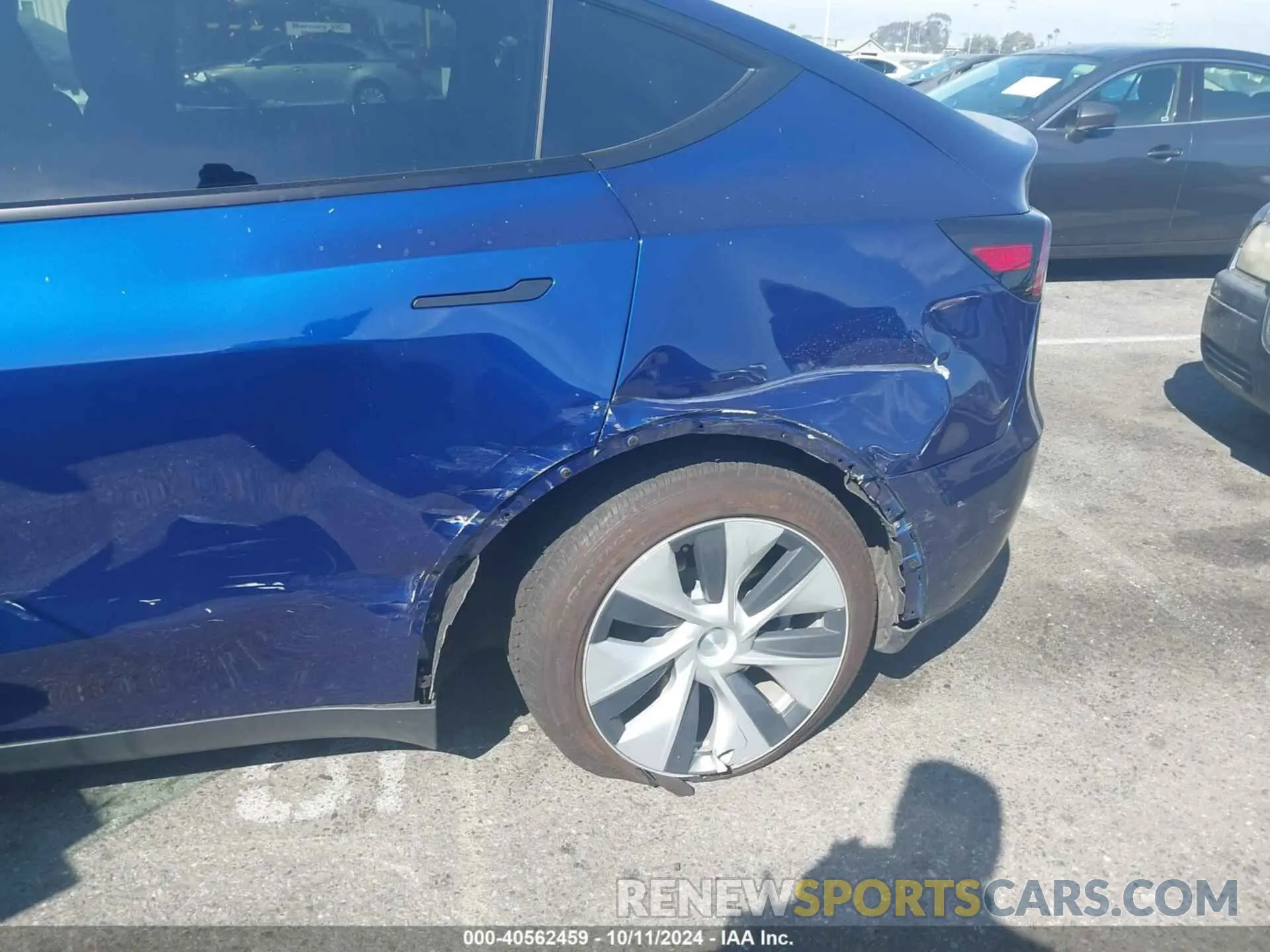 6 Photograph of a damaged car 7SAYGDED3RF047803 TESLA MODEL Y 2024
