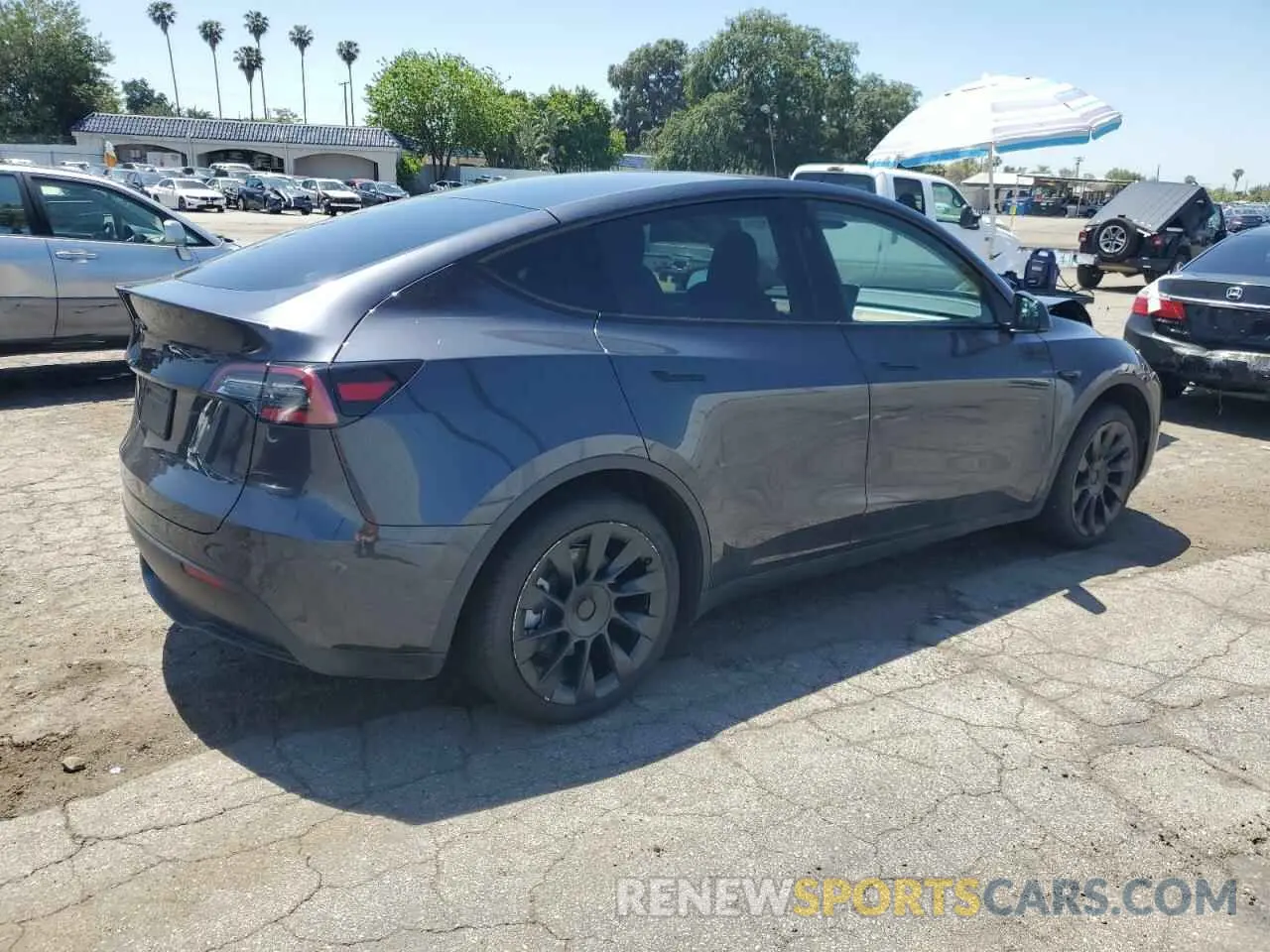 3 Photograph of a damaged car 7SAYGDED3RF056131 TESLA MODEL Y 2024