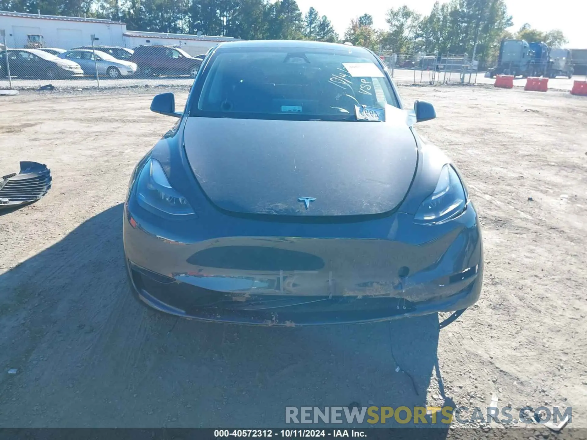 11 Photograph of a damaged car 7SAYGDED3RF092501 TESLA MODEL Y 2024