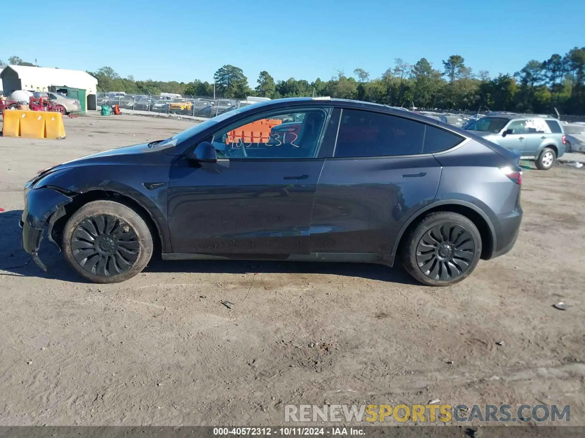 13 Photograph of a damaged car 7SAYGDED3RF092501 TESLA MODEL Y 2024