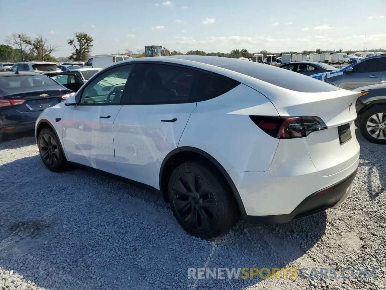 2 Photograph of a damaged car 7SAYGDED3RF131376 TESLA MODEL Y 2024