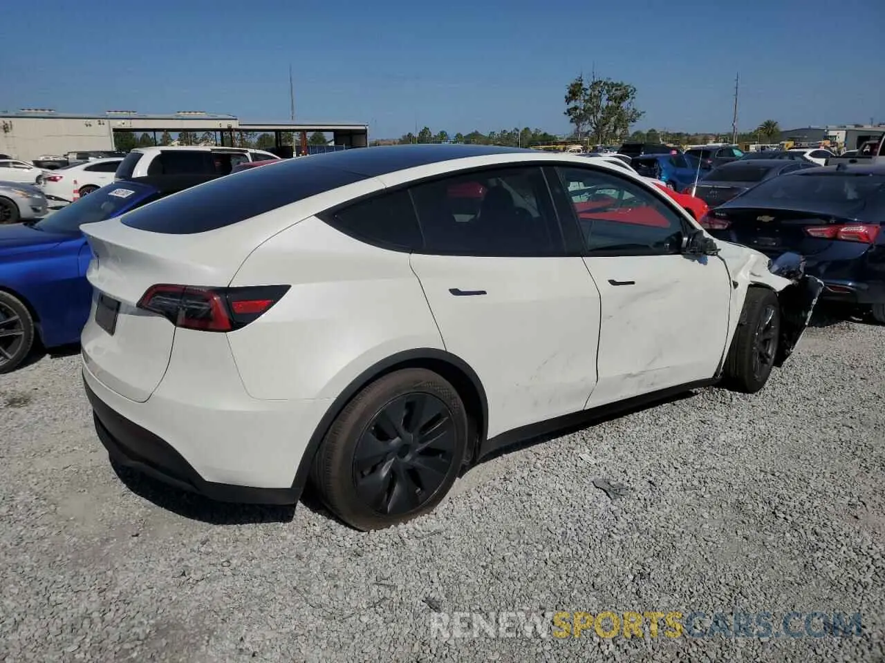 3 Photograph of a damaged car 7SAYGDED3RF131376 TESLA MODEL Y 2024