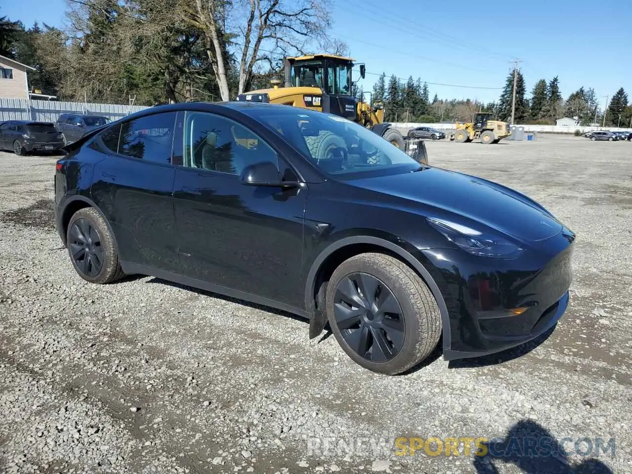 4 Photograph of a damaged car 7SAYGDED3RF151577 TESLA MODEL Y 2024