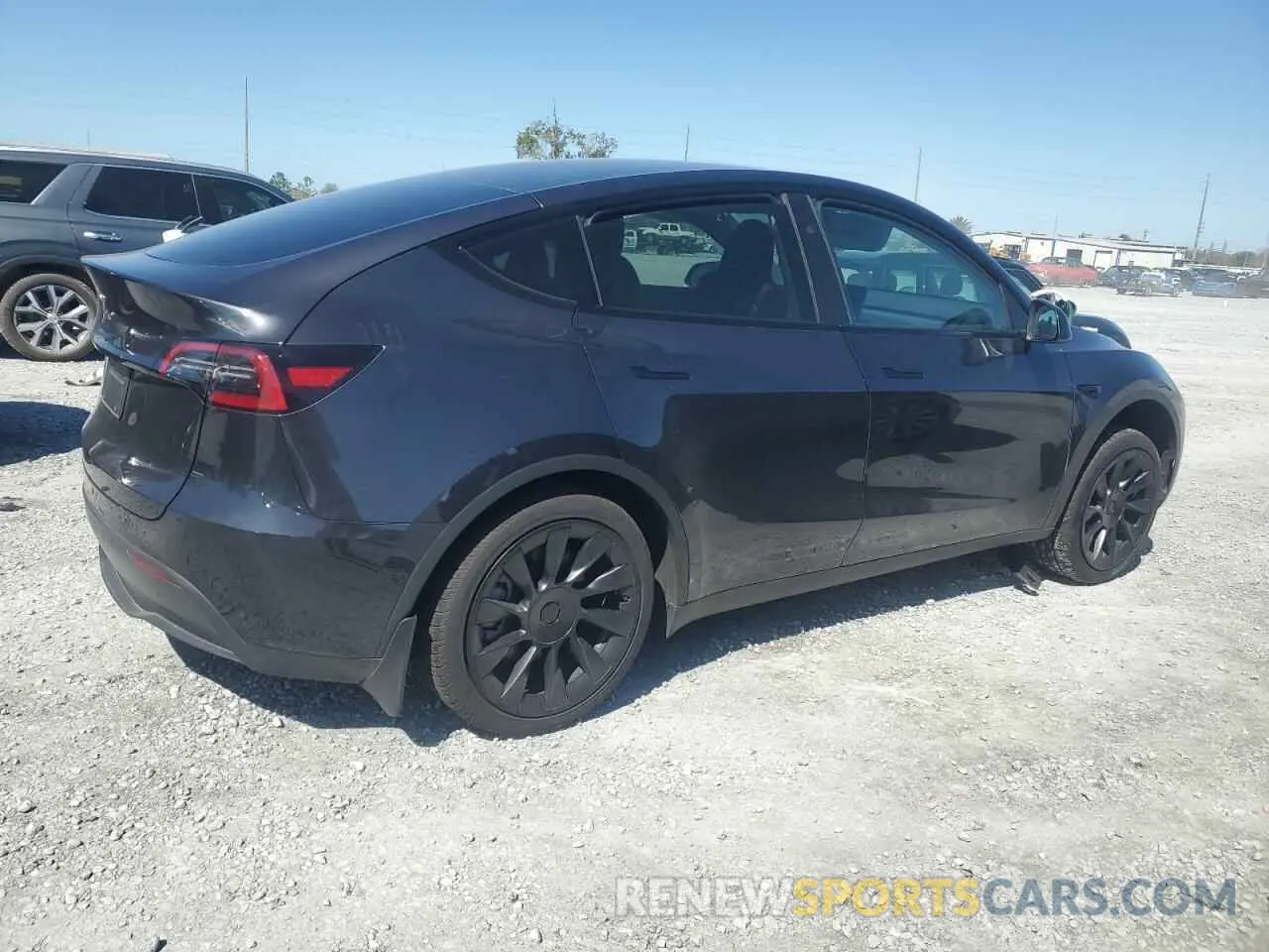 3 Photograph of a damaged car 7SAYGDED3RF177273 TESLA MODEL Y 2024