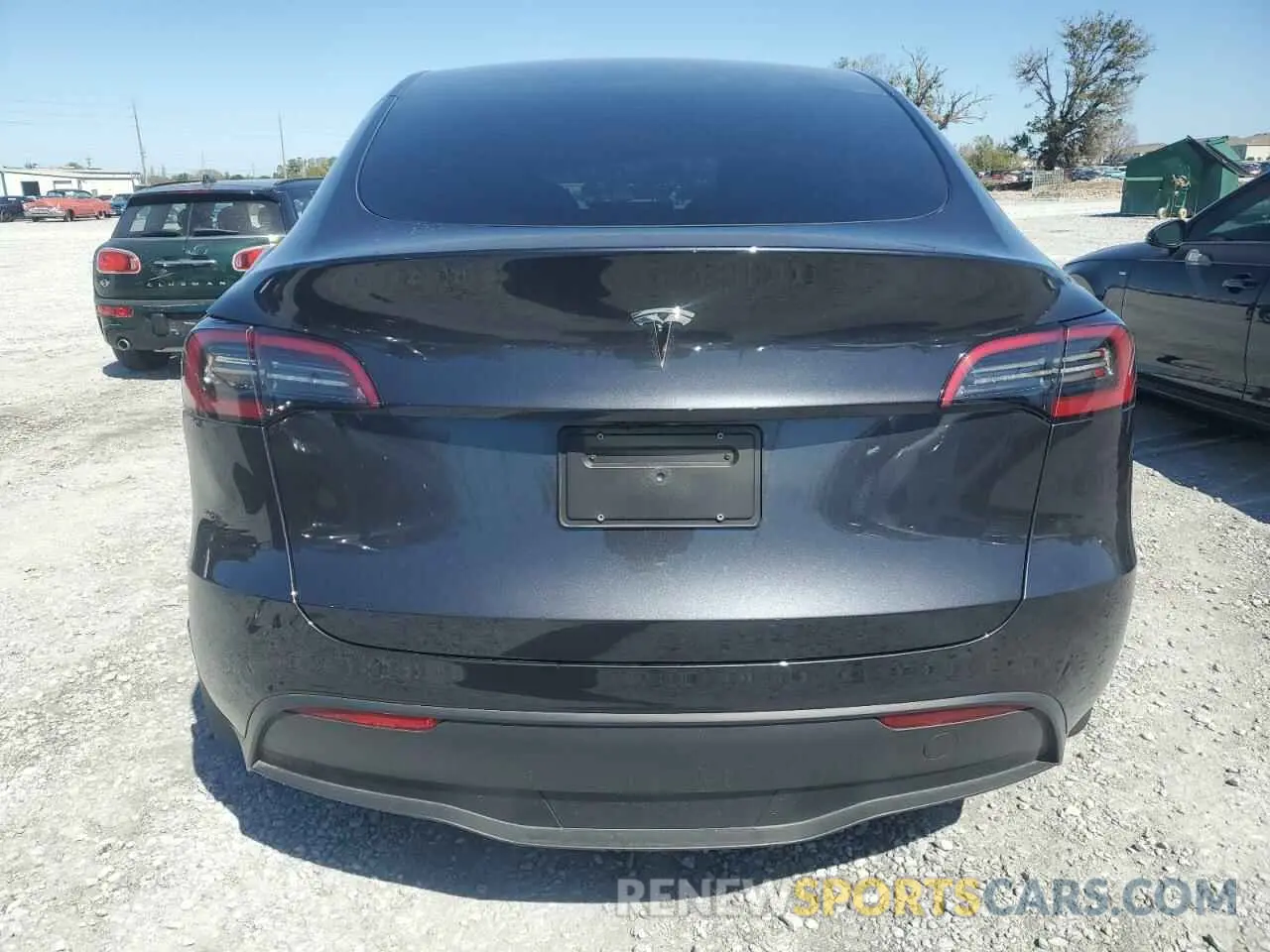6 Photograph of a damaged car 7SAYGDED3RF177273 TESLA MODEL Y 2024