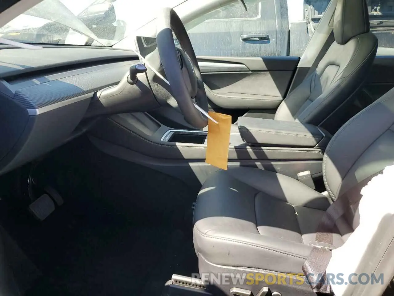 7 Photograph of a damaged car 7SAYGDED3RF177273 TESLA MODEL Y 2024