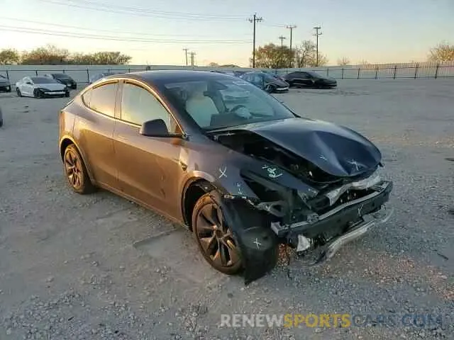 11 Photograph of a damaged car 7SAYGDED4RA324326 TESLA MODEL Y 2024