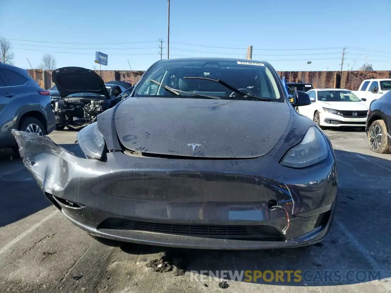 5 Photograph of a damaged car 7SAYGDED4RF089588 TESLA MODEL Y 2024