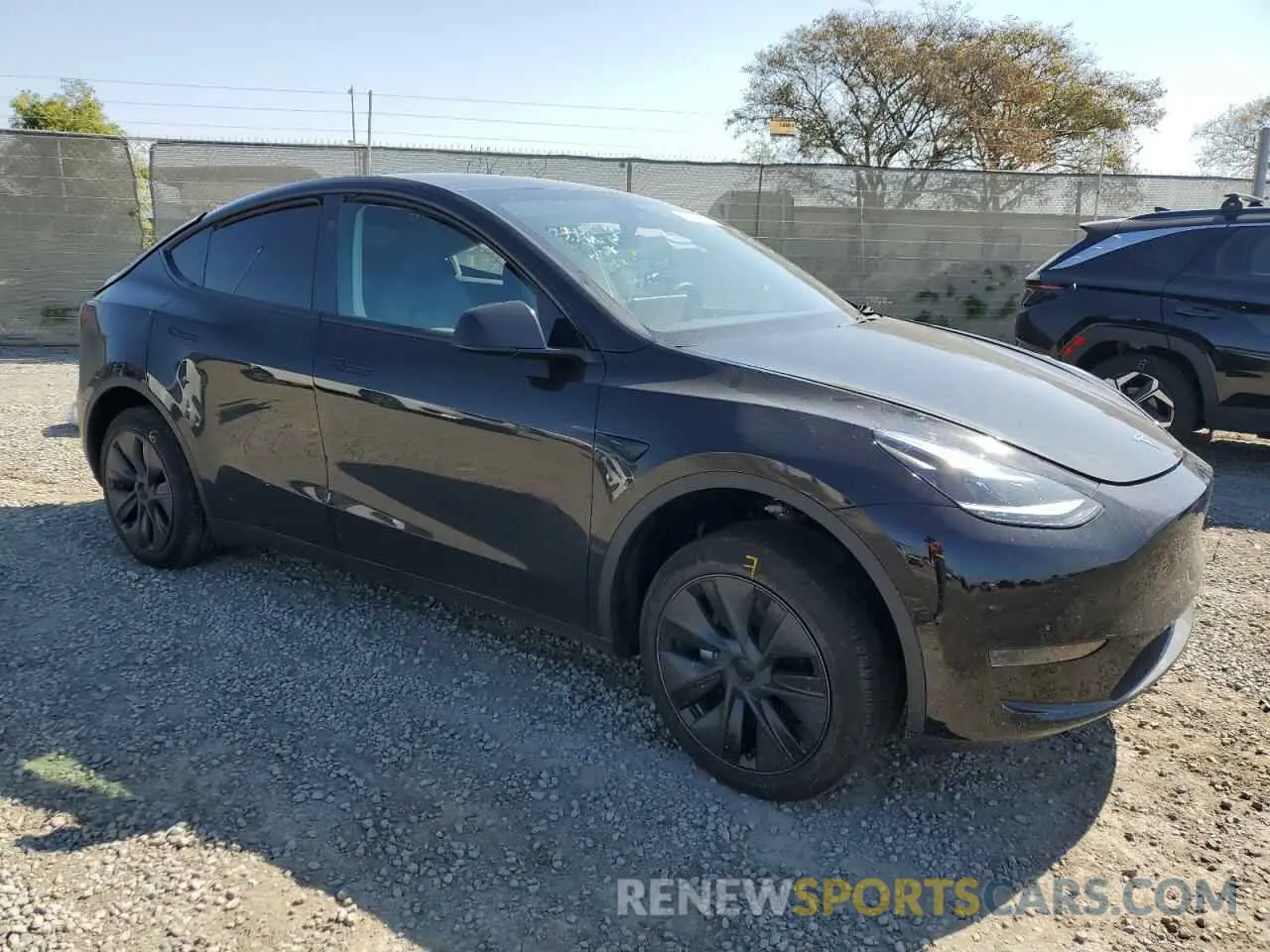 4 Photograph of a damaged car 7SAYGDED4RF212399 TESLA MODEL Y 2024