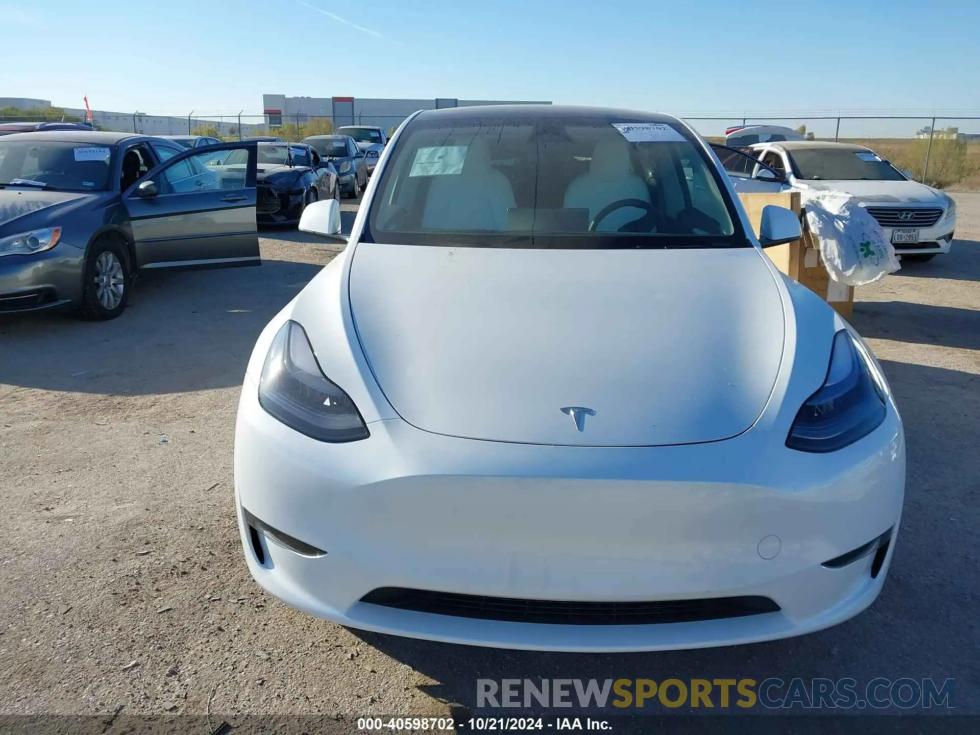 13 Photograph of a damaged car 7SAYGDED5RA310807 TESLA MODEL Y 2024