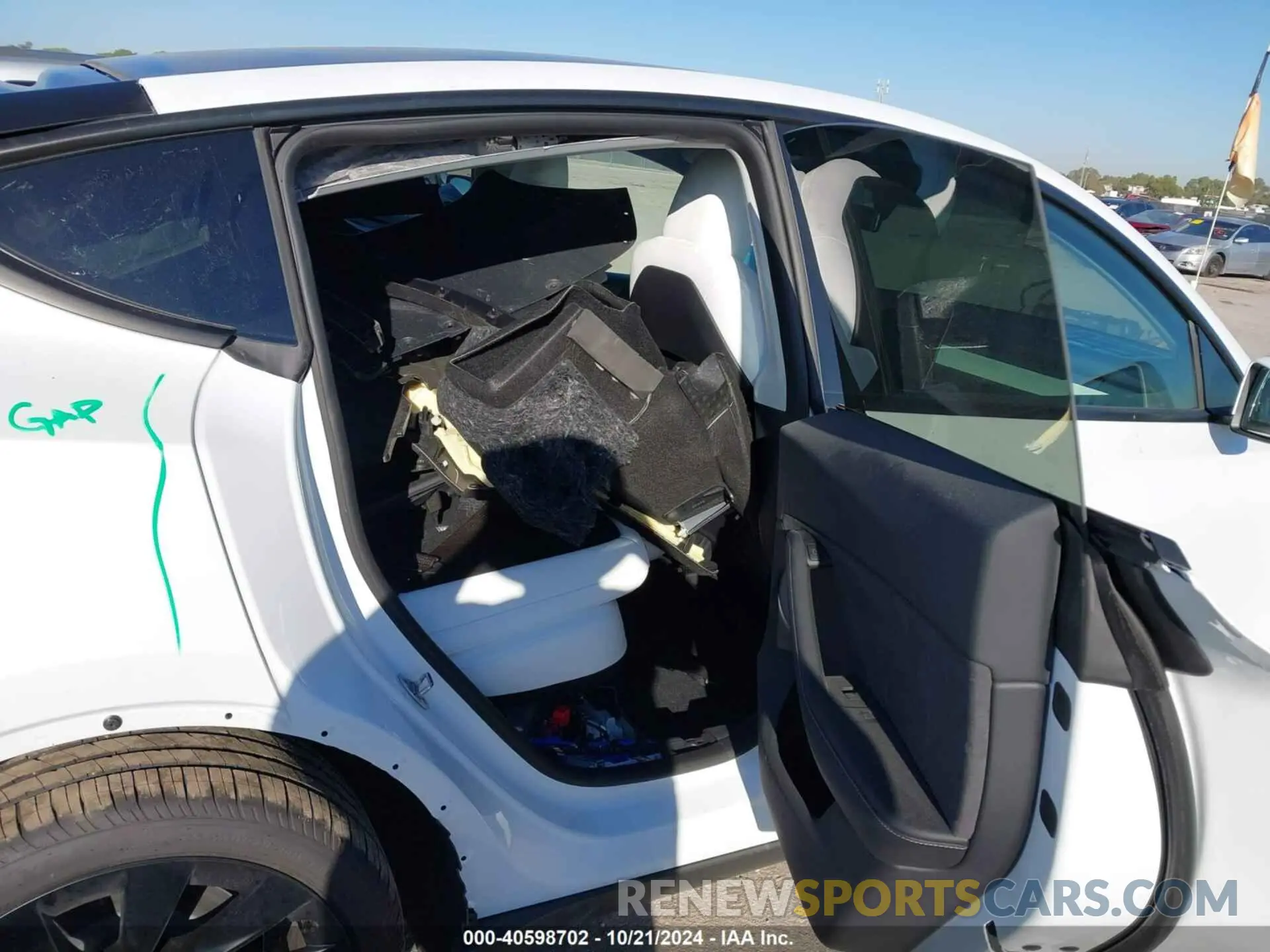 8 Photograph of a damaged car 7SAYGDED5RA310807 TESLA MODEL Y 2024