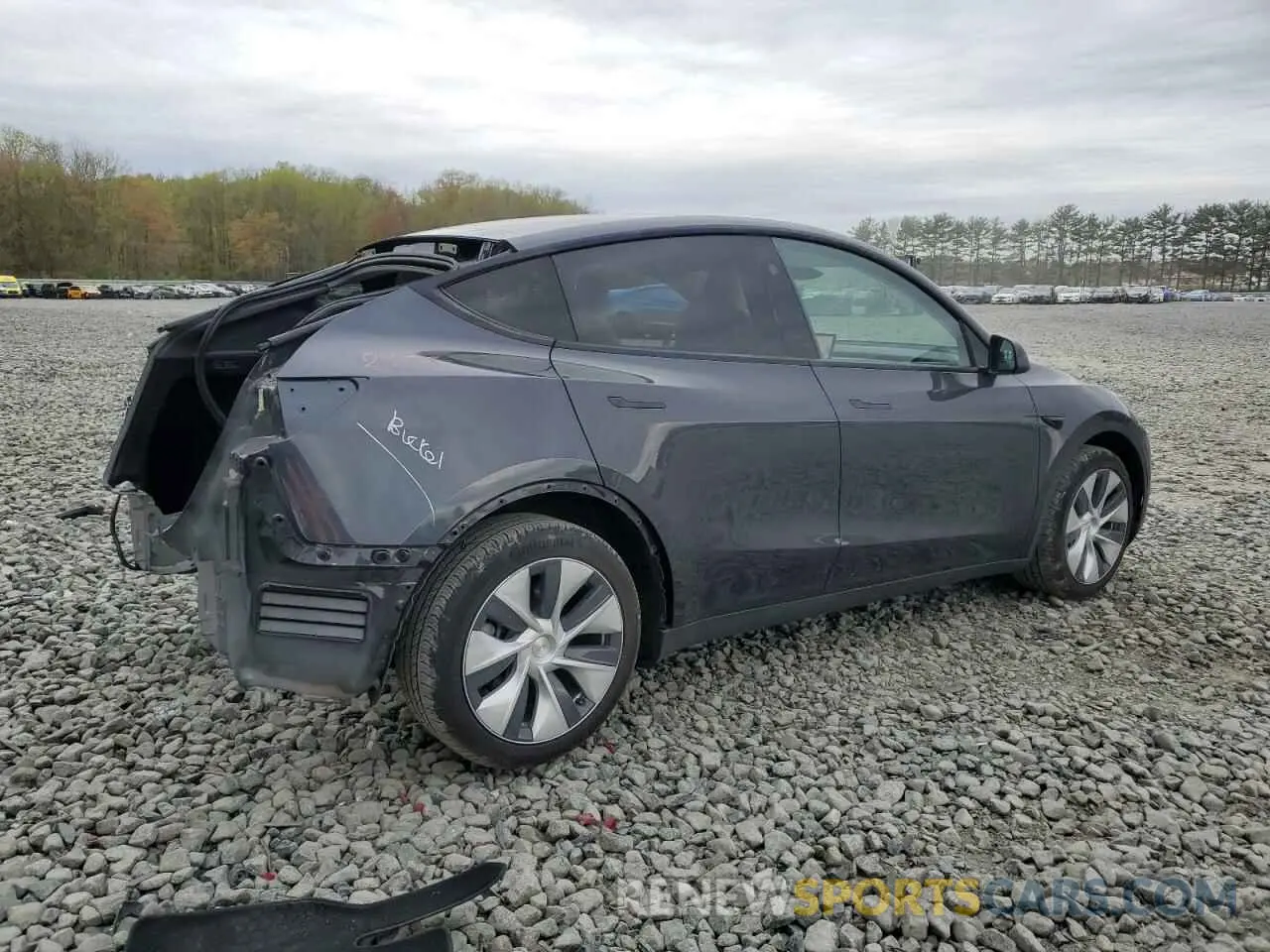 3 Photograph of a damaged car 7SAYGDED5RF009554 TESLA MODEL Y 2024