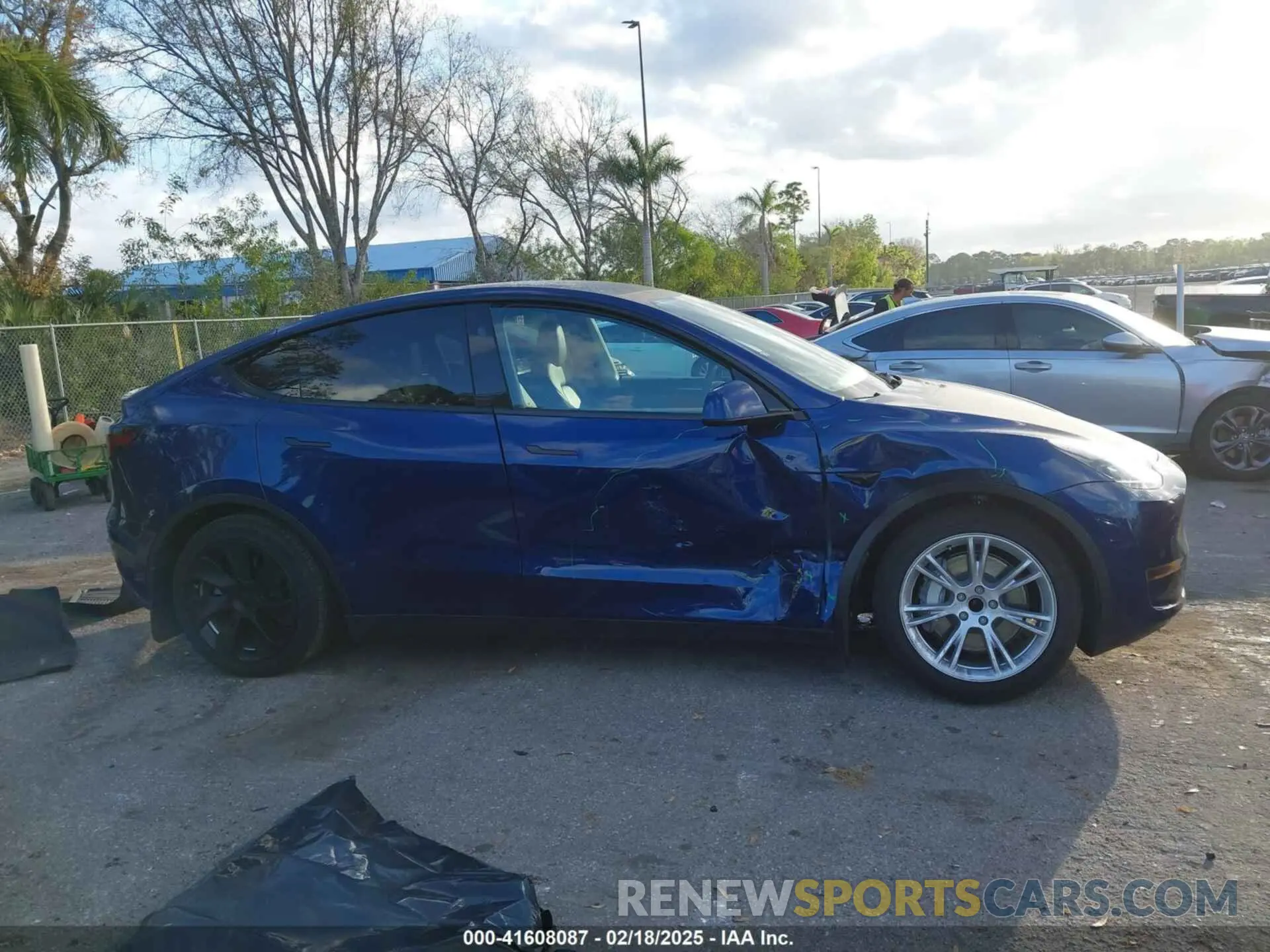 13 Photograph of a damaged car 7SAYGDED5RF015208 TESLA MODEL Y 2024
