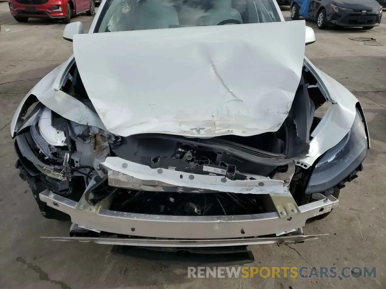 12 Photograph of a damaged car 7SAYGDED5RF045017 TESLA MODEL Y 2024