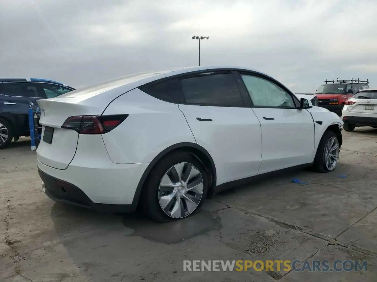 3 Photograph of a damaged car 7SAYGDED5RF045017 TESLA MODEL Y 2024